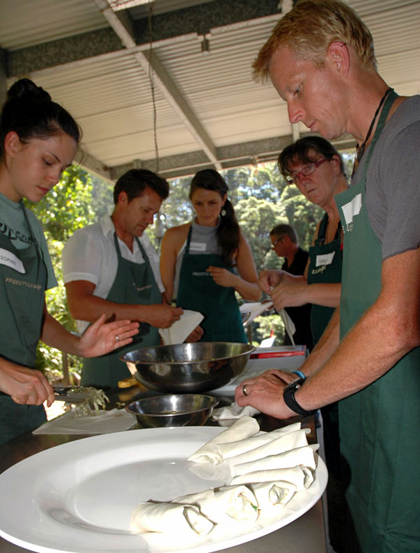 Ben Southall and Sophee making spring rolls at Freestyle Escape