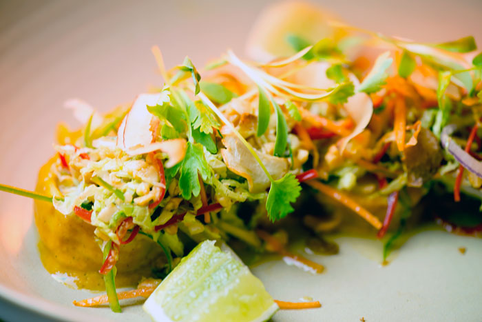 Mooloolaba Prawns with vegetable kottu, roasted coconut, peanuts and betel leaf