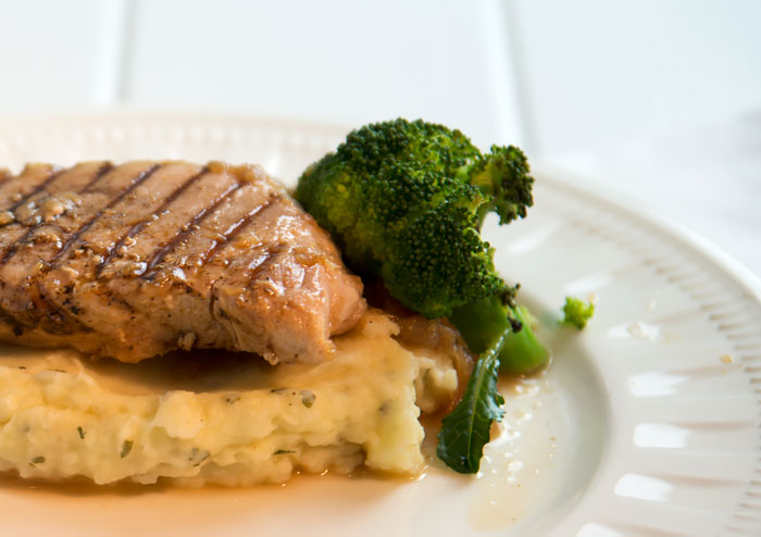 Boneless pork chop with cider sauce